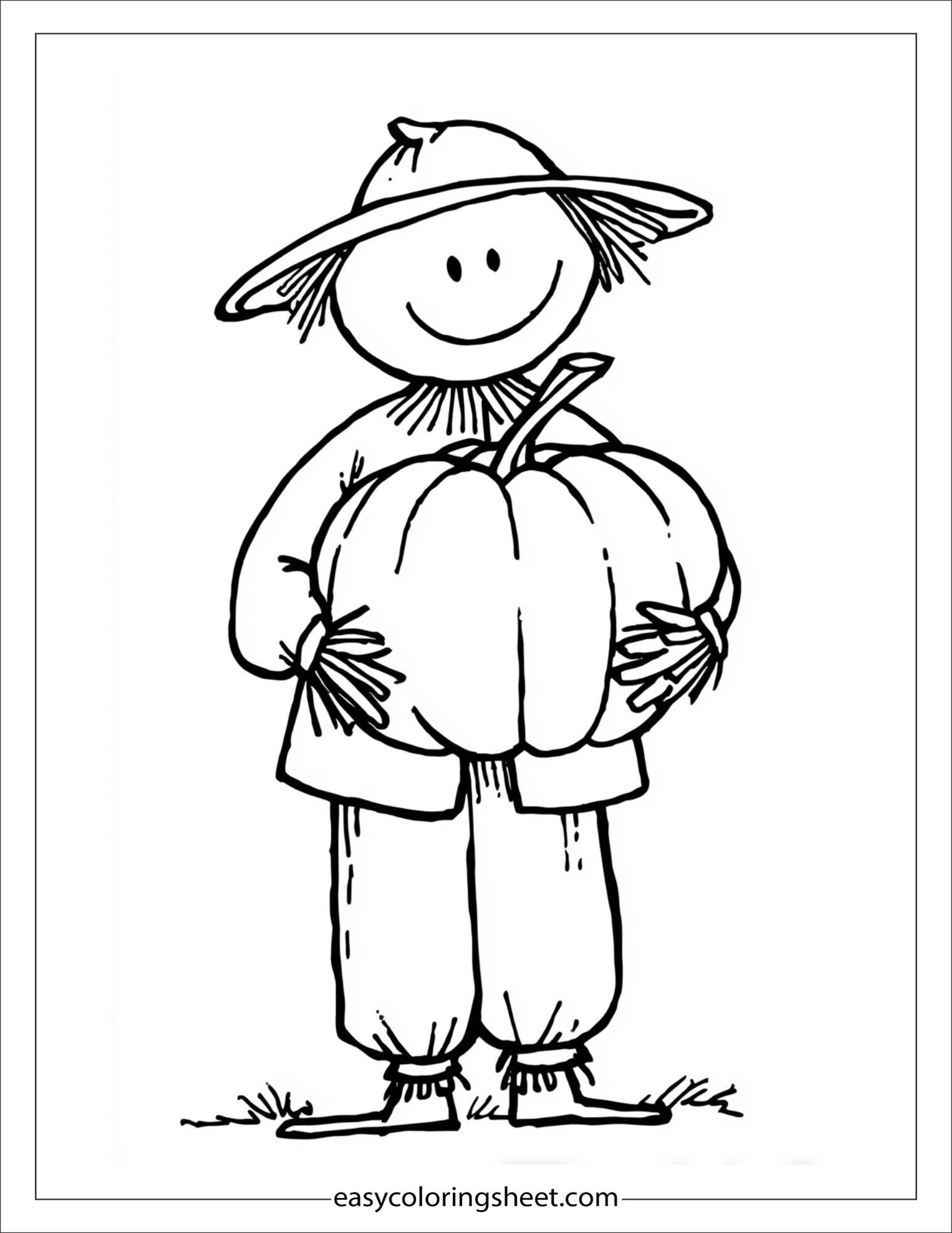 Scarecrow holding a pumpkin