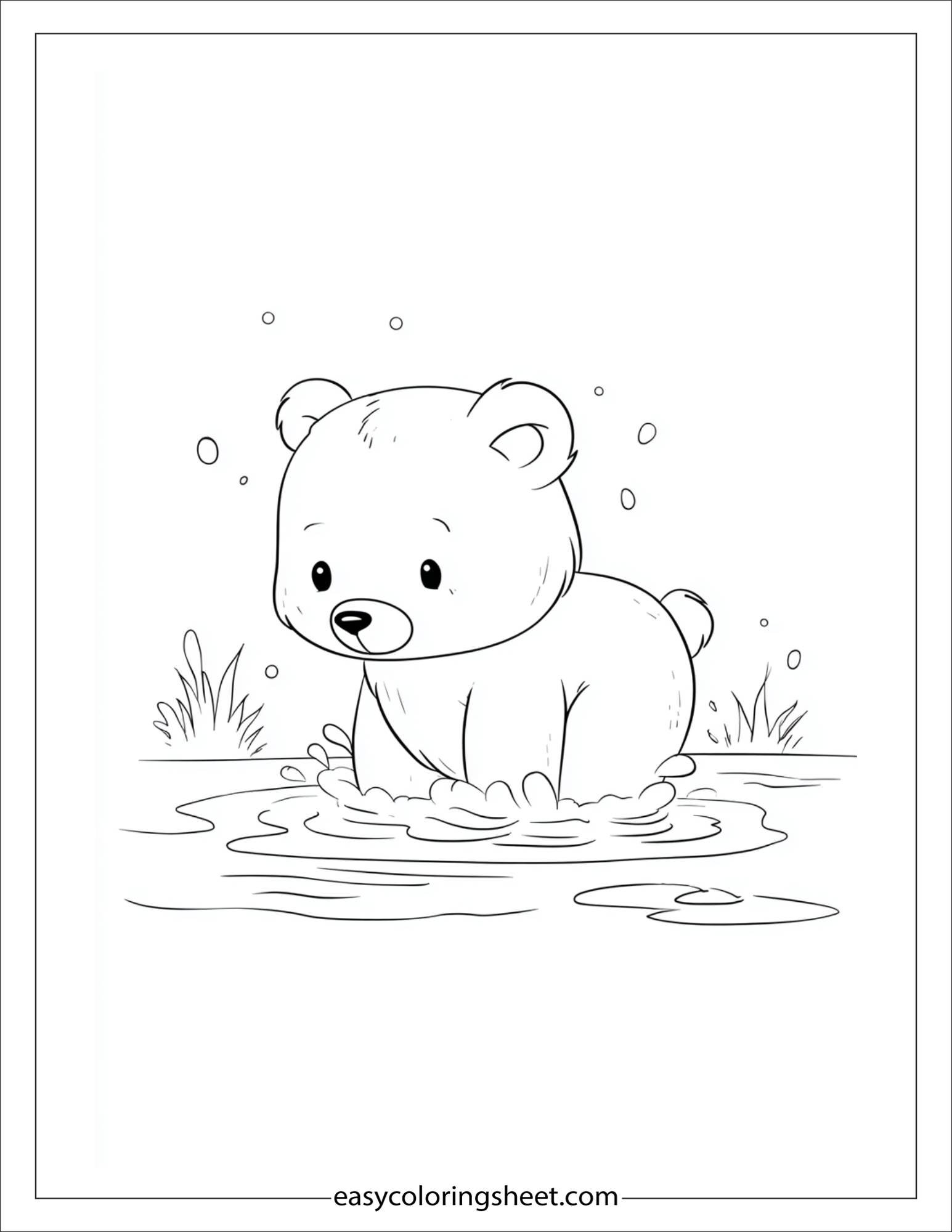 Bear splashing in a puddle